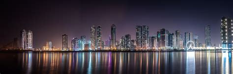 Panoramic View Of City Lit Up At Night · Free Stock Photo