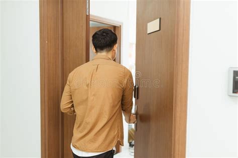 Man Coming Home From Work And Opening Door Of Apartment Stock Image Image Of Twenties