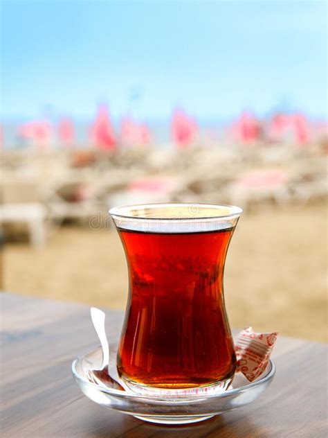 Turkish Tea In A Traditional Glass Tulip Bardak Against The Background