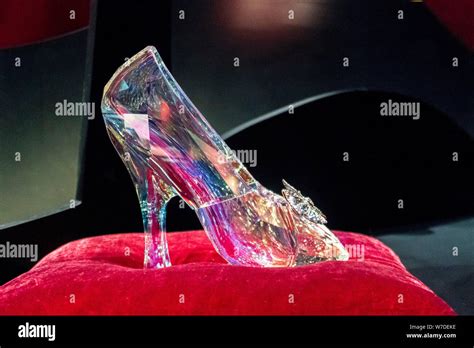 A Glass Slipper Of Cinderellas Shoe Is On Display Duirng The Shoes