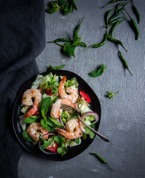 Thai shrimp crunch salad made with a delicious and easy peanut sesame dressing and topped with crispy shrimp and crunchy almonds. Easy Spicy Thai Shrimp Salad (Pla Goong Salad Recipe ...