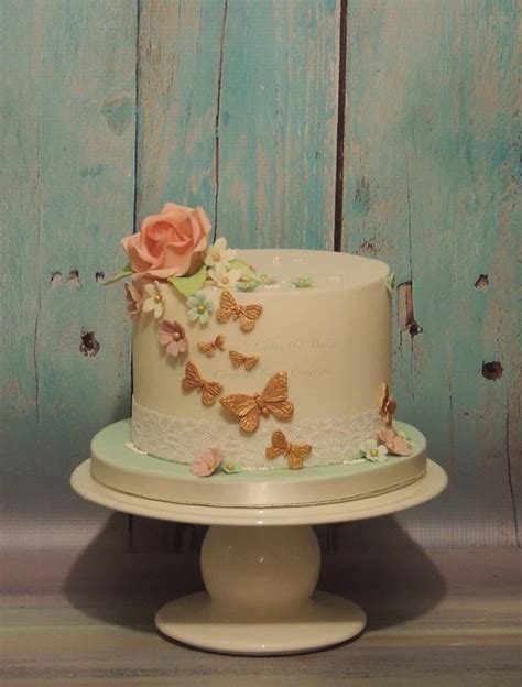 Flowers And Butterflies Decorated Cake By Shereen Cakesdecor