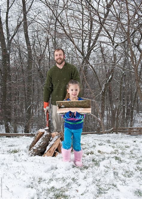 Splitting Firewood Daughter Helps With Household Chores Stock Image Everypixel
