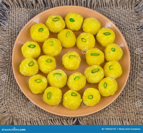 Indian Traditional Yellow Sweet Food Coconut Laddu On Wooden Background Stock Image Image Of