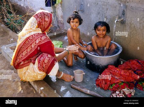 Mother Bathing Daughters Bhujodi Gujarat India Stock Photo Alamy