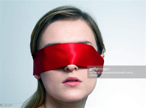 Woman Wearing Red Blindfold Photo Getty Images