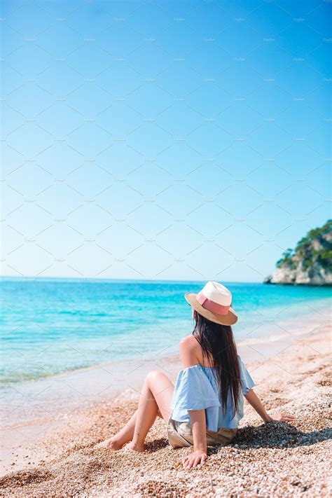 Woman Laying On The Beach Enjoying S Stock Photo Containing Beach And