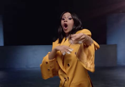 Now she say she gon' do what to who? Copy Cardi B's Yellow Power Suit In The Maroon 5 Music ...