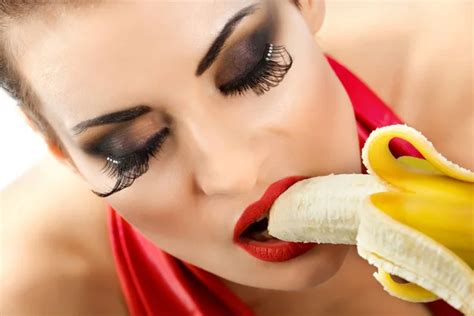 Woman Eating Banana Stock Photo By KorolOK 115731654