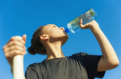 Woman Drink Water After Exercise Stock Photo By ©guruxox 119190800