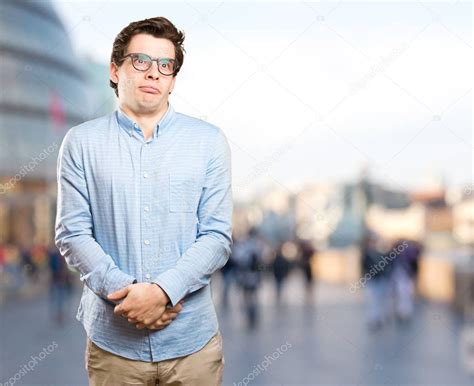 Frustrated young man posing — Stock Photo © agongallud ...