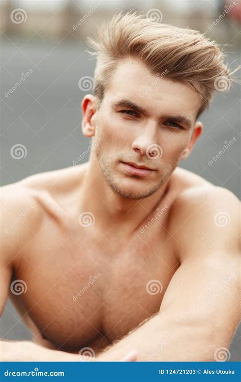 Fresh Portrait Of A Handsome American Guy With A Hairstyle With Stock