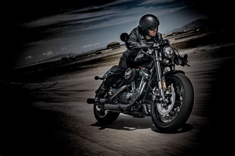 In vivid black with racing graphics. 2018 Harley-Davidson Roadster Review • TotalMotorcycle