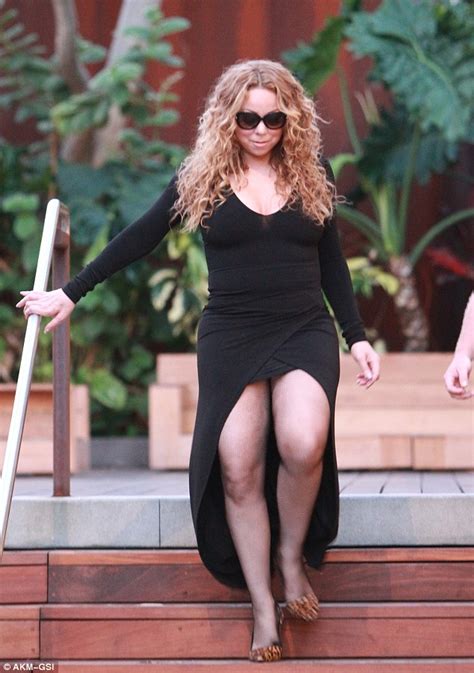 global photo mariah carey flashes her very shapely legs in plunging mini dress with waterfall