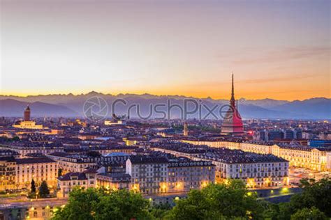Cityscape Of Torino Turin Italy At Dusk With Colorful Moody Stock