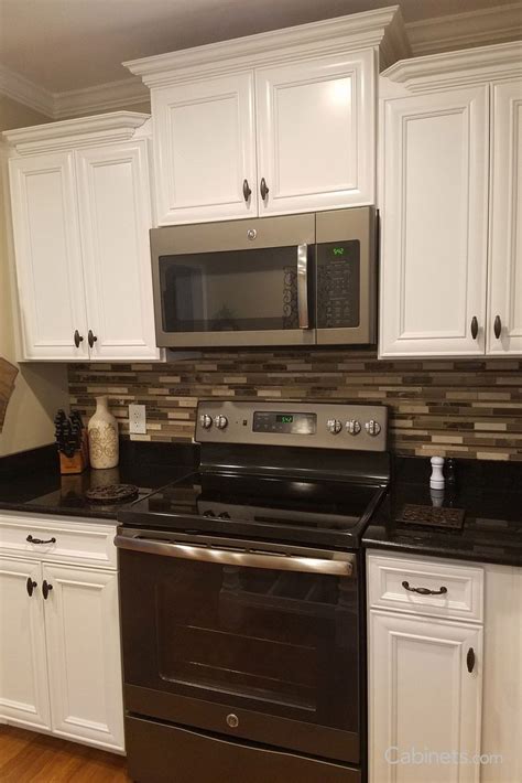 Jan 24, 2021 · stacked in the tidy arrangement, the black and white glass tile kitchen backsplash brings in tidy and contrary feelings. Black and white kitchen with a linear glass mosaic tile ...