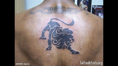 Runic tattoos on both clavicle bones. 6598-tribal-lion-tattoo-artistsorg-tattoo-design-2400x1350 ...