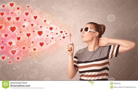 Pretty Young Girl Blowing Red Heart Symbols Stock Photo Image Of