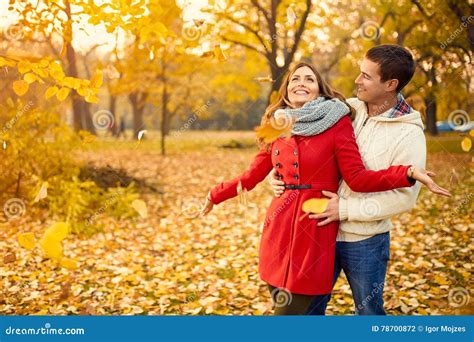 Love Couple In Autumn Walking In Park Stock Photo Image Of Fall