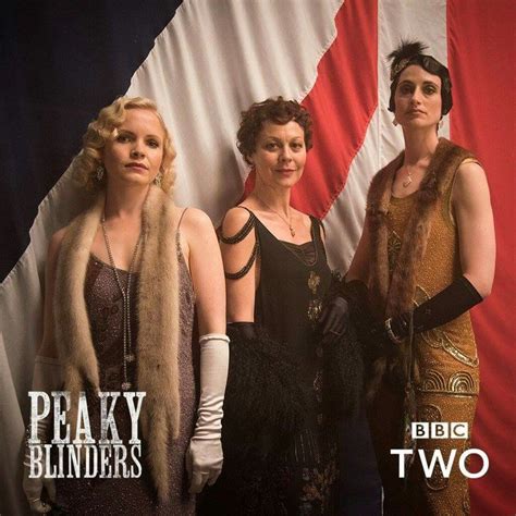 Three Women Standing Next To Each Other In Front Of An American Flag With The Words Peaky