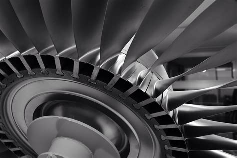 A Close Up View Of The Inside Of An Airplanes Turbine Blades And Rotors