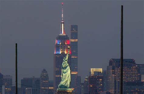 Empire State Building And The Statue Of Liberty American Landmarks