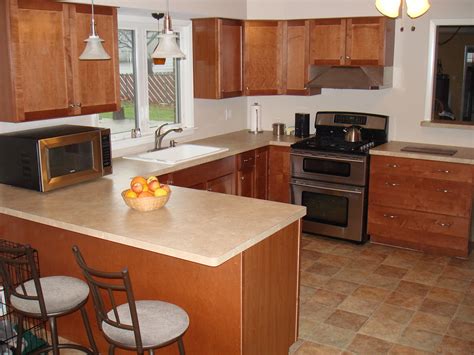 If you are on the hunt for elegant, durable, and easy to maintain countertop laminates, you have come to the right place! Kitchen | Northtowns Remodeling Corp.