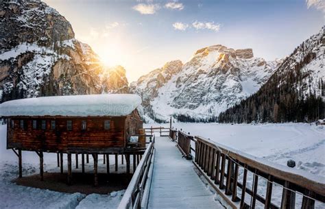Winter Sunrise Over The Frozen Lago Di Braies In The Dolomites Italy
