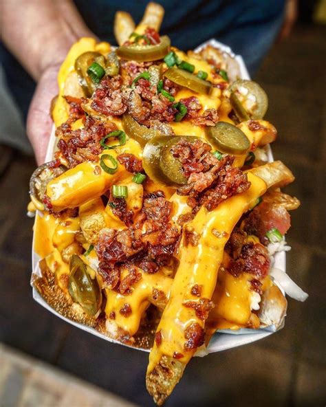 Our fries start as idaho® potatoes and are cut fresh, tossed in our signature seasoning, and served hot 'n fresh. Loaded cheese fries with bacon and jalapeno - Yumm ! 🍕
