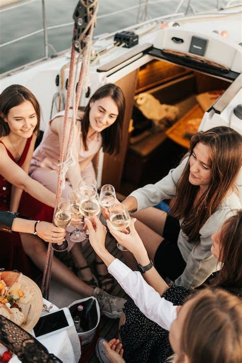Group Of Women On Yacht Drinking · Free Stock Photo
