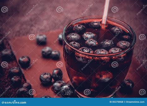 Bilberry Drink With The Berries And Ice Cubes Stock Photo Image Of