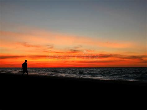 Silhouette Man Walking On Sunset Beach Stock Image Image Of Horizon