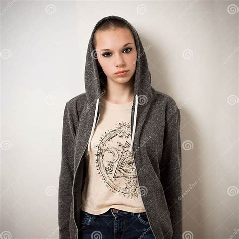 Beautiful Young Youth Girl With Shaven Head In Hoody Stock Photo