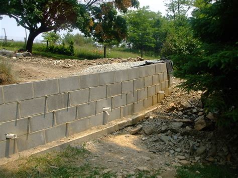 Retainig walls can be a great addition to the services you offer and solve a variety of landscape problems. Concrete Block Retaining Wall Drainage | Flickr - Photo ...