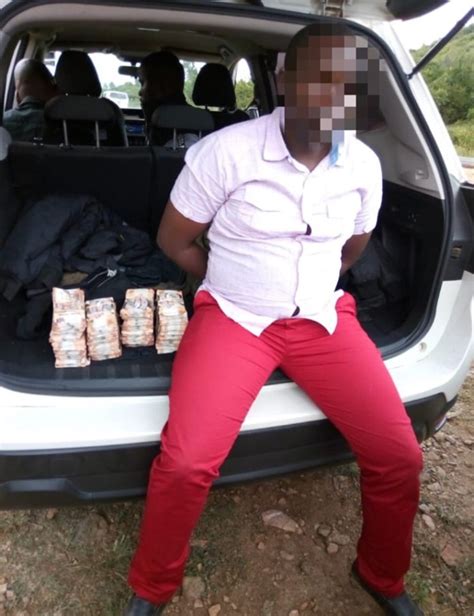 Two Police Officers Arrested With Millions From Atm Robbery Photos