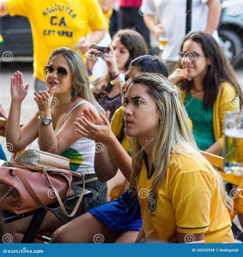 Brazilian Girls Watching World Cup Match On Tv At A Bar Editorial Image