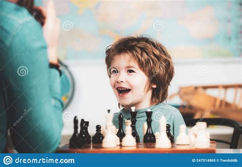 Child Chess School Cheerful Smiling Little Boy Sitting At The Table