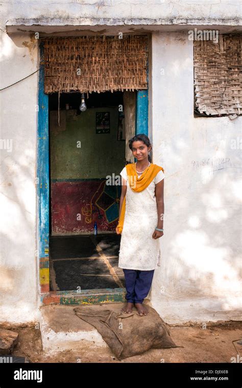 Rural Indian Teenage Village Girl Standing In Front Of Her House Door