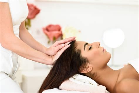 Premium Photo Woman Receiving Head Massage In Spa Wellness Center