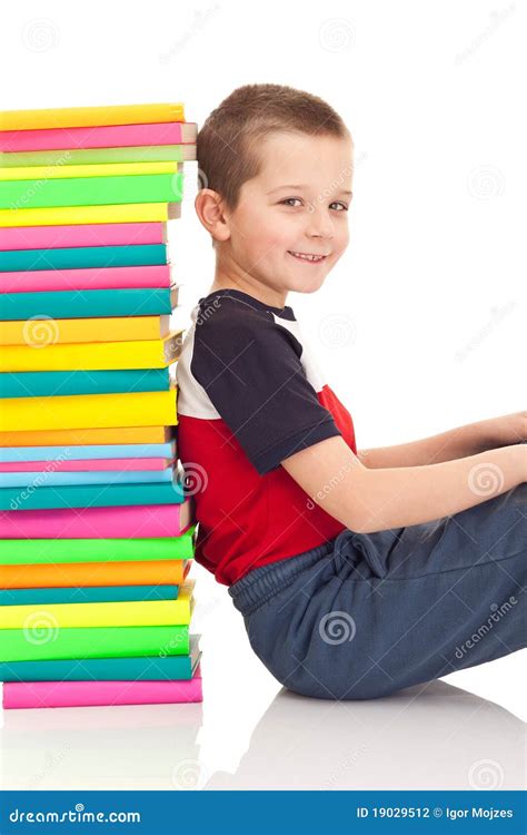 Boy Sitting Next To Stack Of Books Stock Photo Image Of Education