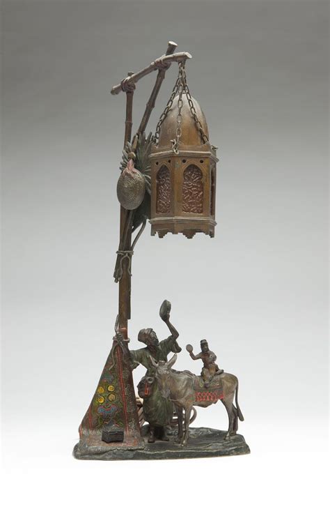 An Austrian Cold Painted Bronze Figural Lamp Chotka The Traveling