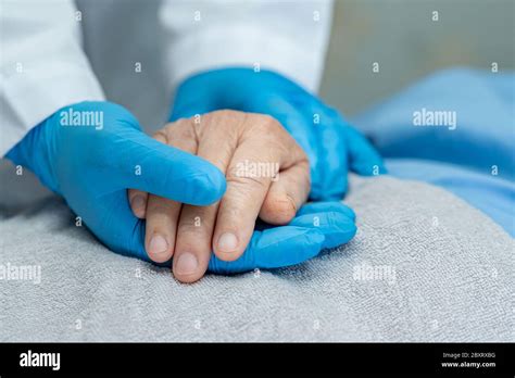Doctor Holding Touching Hands Asian Senior Or Elderly Old Lady Woman