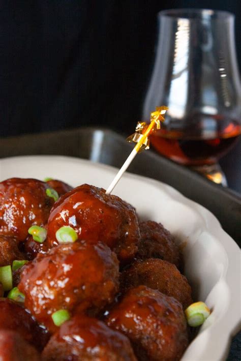 Toss all those ingredients into your slow cooker, then pour yourself a glass of some leftover bourbon whiskey, and enjoy what is going to be one of your. Bourbon Meatballs | Meatballs, Bourbon meatballs, Grape ...