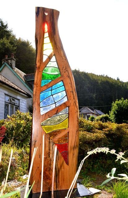 Stained Glass And Wood Sculpture In 2020 Wood Sculpture Outdoor Sculpture Stained Glass Crafts