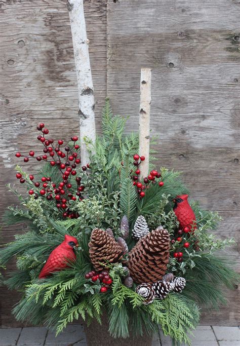 Festive Outdoor Winter Urn With Pinecones And Cardinals