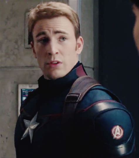 Captain America The Winter Soldier Is Looking At Another Man In A Suit