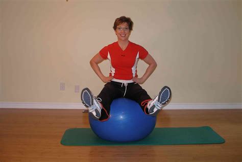 Bilateral Leg Raise On The Exercise Ball Hands On Hips