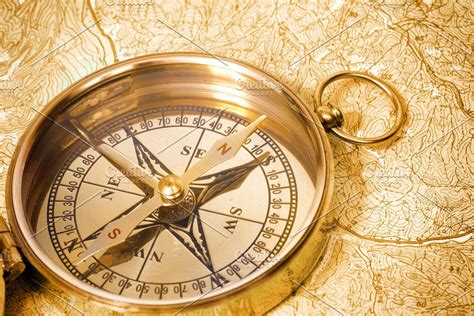 Ancient Compass On A Map Containing Compass Map And Old The Golden Compass Compass Gold