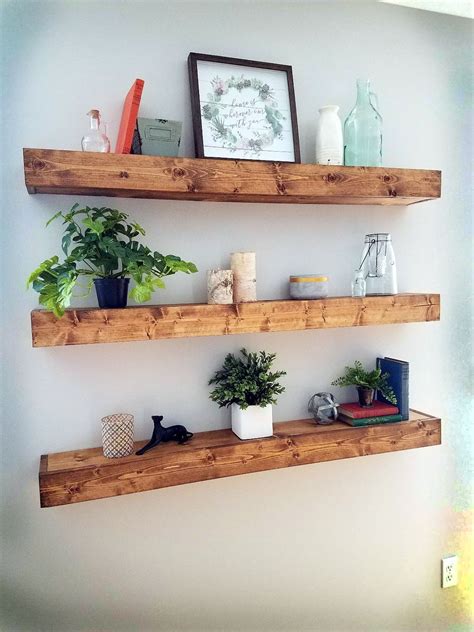 What's great about this design is that you can modify it and make the bookshelves as tall as you need them. DIY Primitive Floating Bookshelves #handmade #crafts # ...