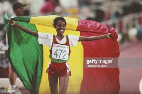 Ethiopian Long Distance Runner Derartu Tulu Celebrates With The